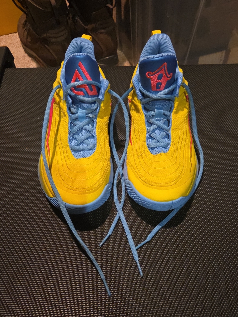 Nike Giannis Yellow and Blue Basketball Sneakers with Pink Accent